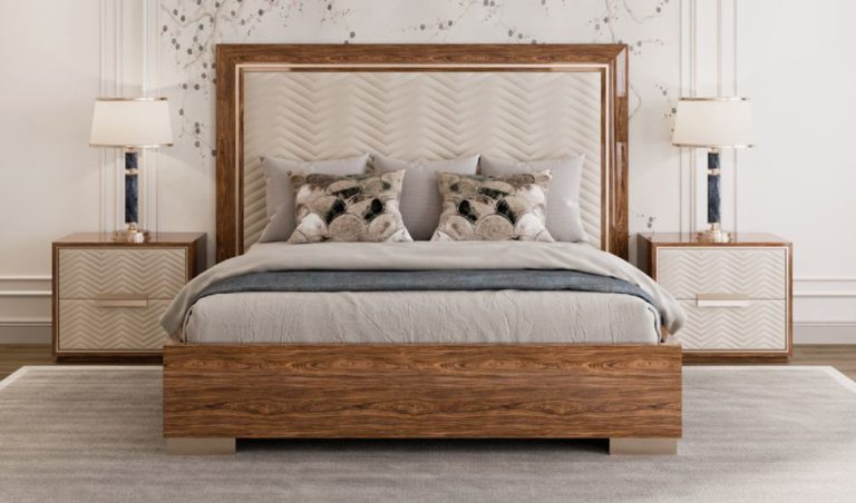 Bed with a walnut frame and a patterned upholstered headboard