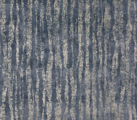 Fabric with a painterly vertical stripe in indigo