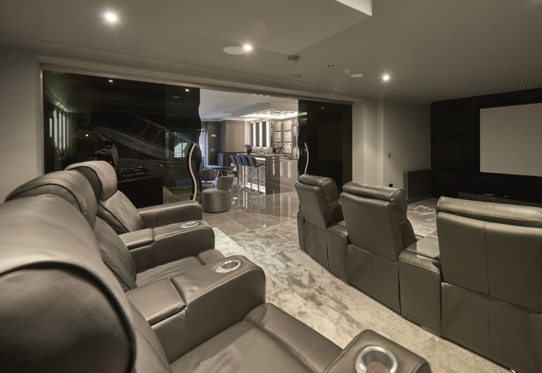 Home cinema seating on two levels in a Cheshire house
