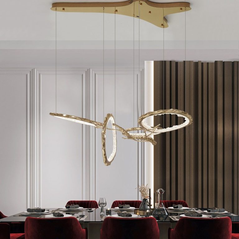 Sculptural ring pendant above a dining table