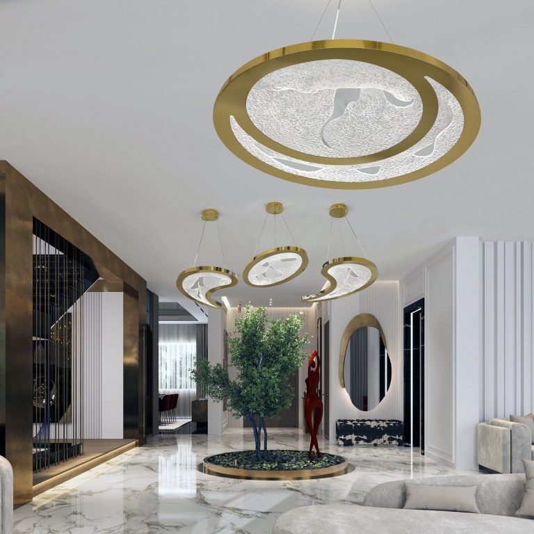 Gold ring pendants with inset panels in a hallway