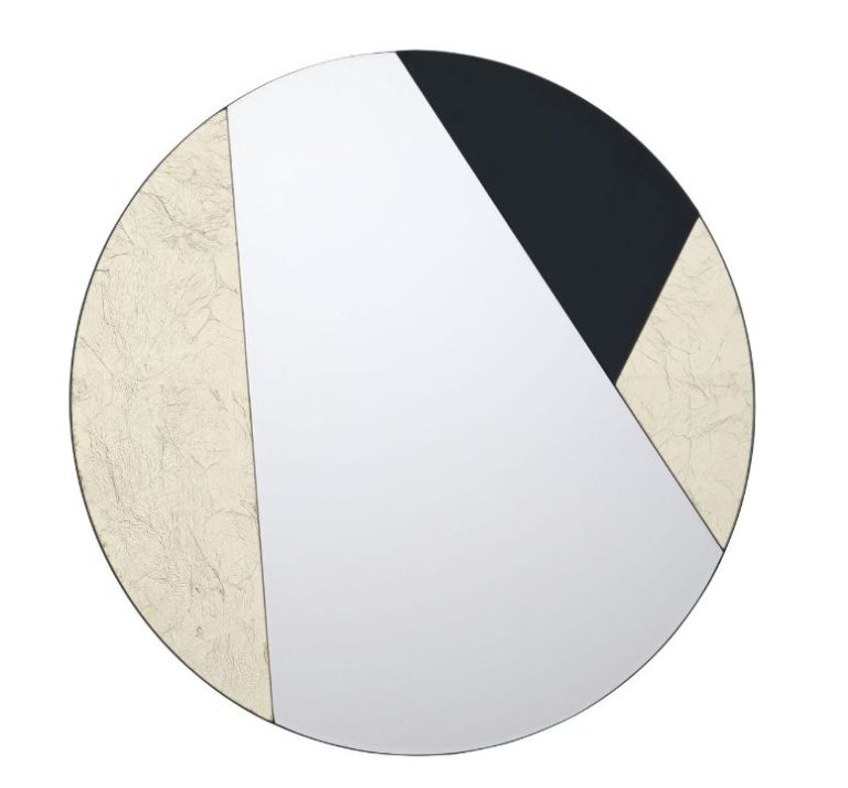 Round wall mirror with a geometric cream and black inlay