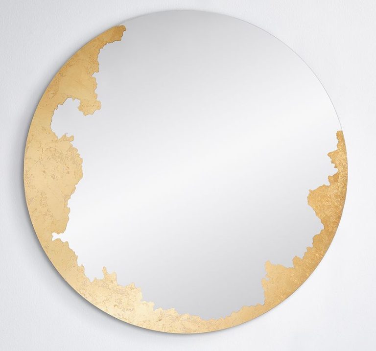 Wall mirror with an irregular organic outline