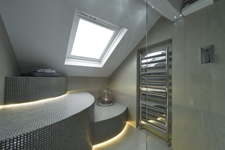 Shower and heated rail below the rooflight