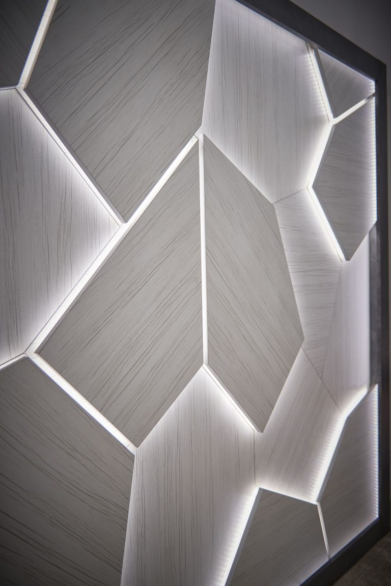 Detail of the backlit faceted panel