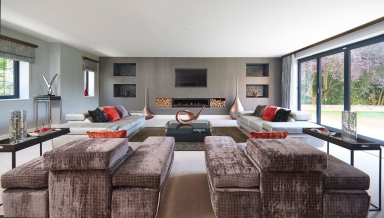 Living room with a linear fire and two facing sofas