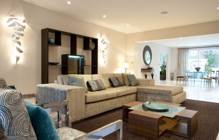 Lounge with a bespoke display wall unit and a corner sofa