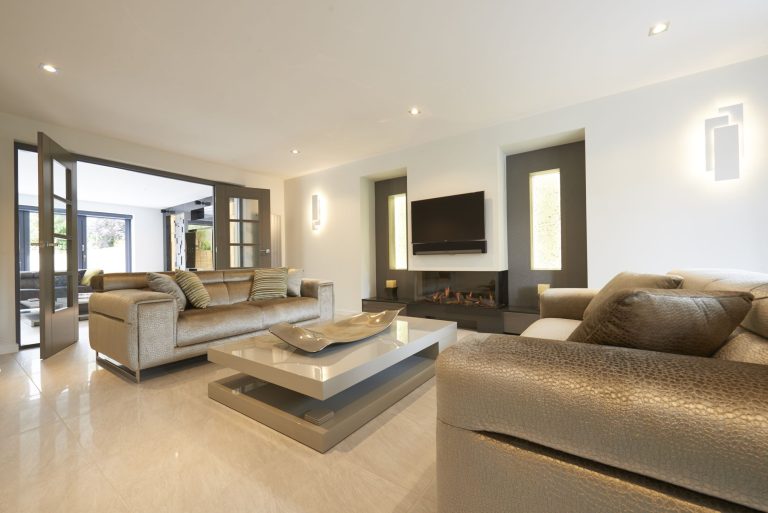 Living room in greys and taupe with a stone coffee table